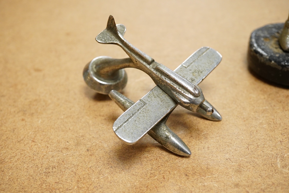 A chrome seaplane car mascot (lacking propellor) and a chrome imp car mascot- 14cm high